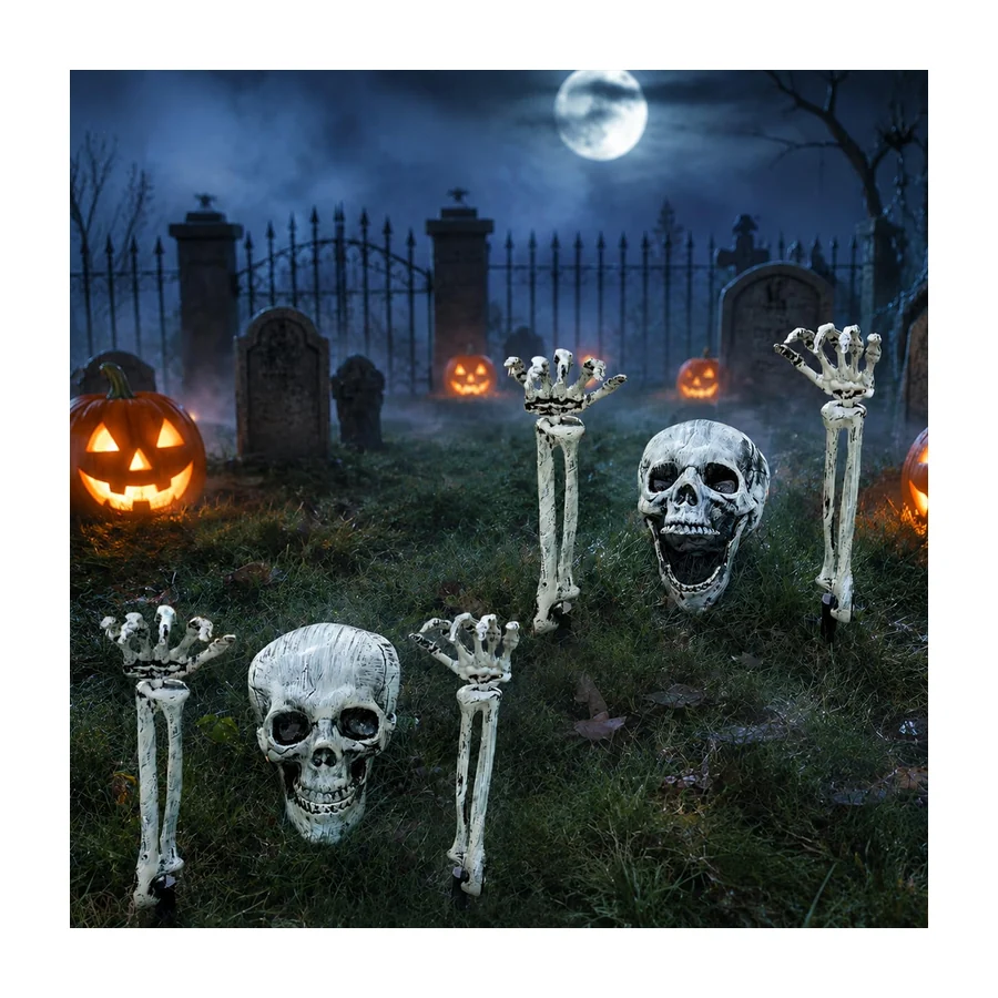 A skeleton skull and ribcage staked half out of the ground