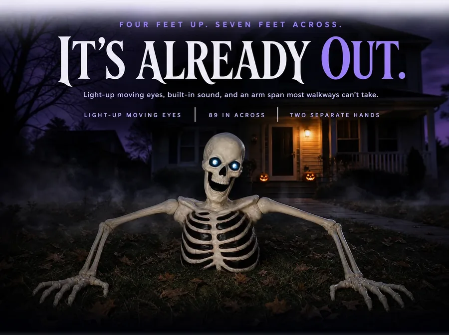 The groundbreaker on a suburban lawn at night, arms wide, its blue eyes lit, under the line It's already out.
